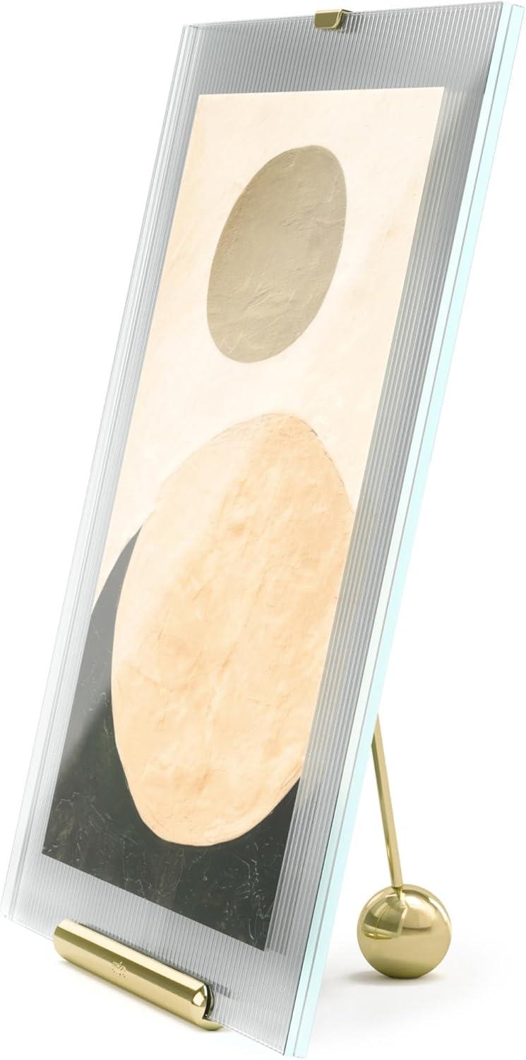 image:imageUmbra Flute 5x7 Floating Picture Frame Modern Glass Photo Frame with Ribbed Backing and Integrated Easel Tabletop Display for Photos or Artwork ChromeBrass