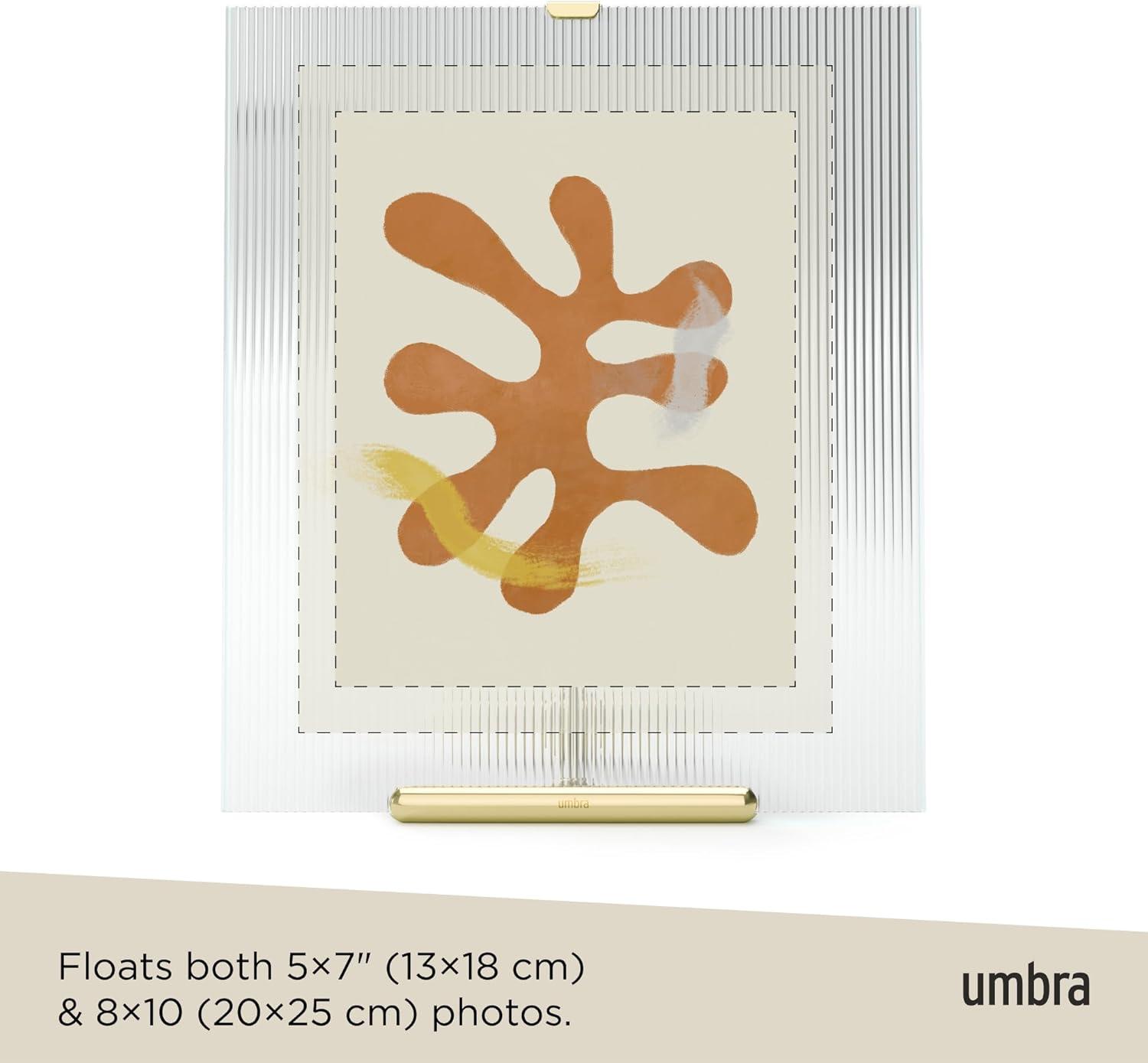 image:imageUmbra Flute 5x7 Floating Picture Frame Modern Glass Photo Frame with Ribbed Backing and Integrated Easel Tabletop Display for Photos or Artwork ChromeBrass